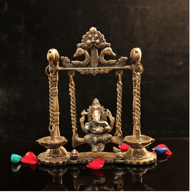 Ganesha on Swing(Jhula) with Hanging Diya